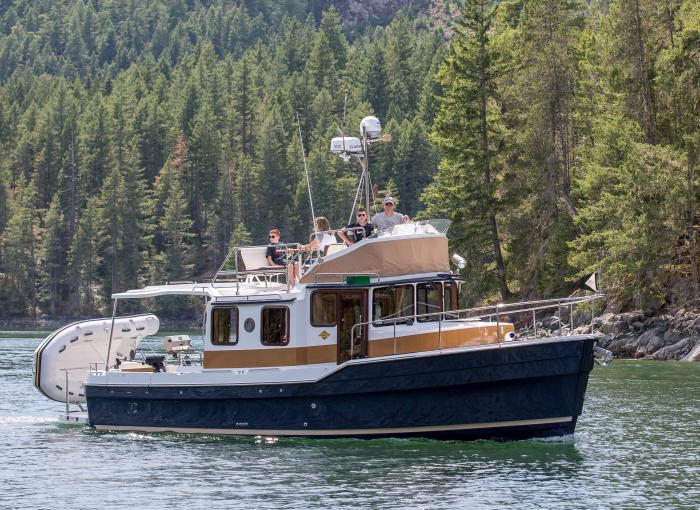 Family cruising the Bay in their new Ranger Tugs boat.